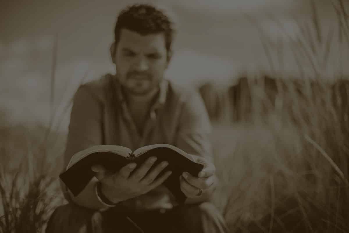 man-reading-roadmap-on-the-field